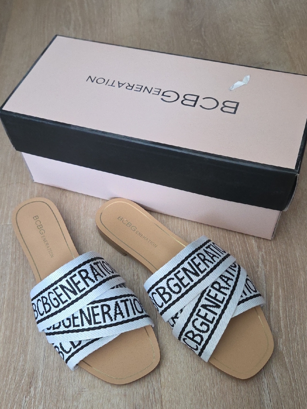 BCBGeneration White and Tan Branded Slide Sandals